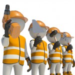 Workteam in special clothes and helmet holding tools