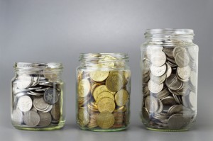 Coins in The Three Different Size of Jar - Financial Concept