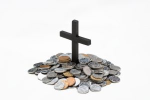 Coin grave with black cross